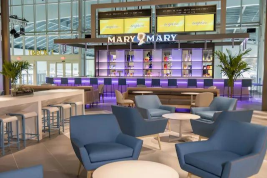 Interior of 'Mary Mary' bar inside the station, showcasing the exquisite design by Bigtime Design Studios. The space exudes sophistication with its captivating decor, creating a stylish and inviting atmosphere for patrons.